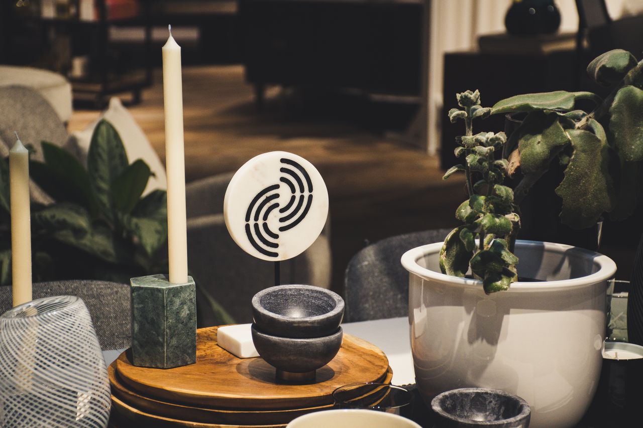 services-img A stylish indoor scene featuring candlesticks, plants, and modern decor elements for home inspiration.